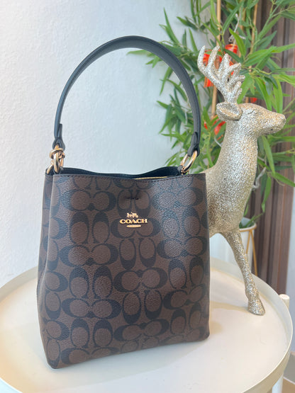 Black Stamped Coach/Black Interior