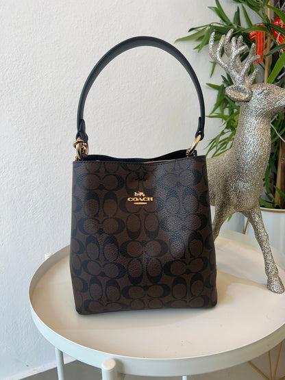 Black Stamped Coach/Black Interior