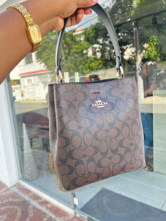 Black Stamped Coach/Black Interior